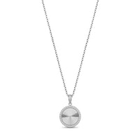 Close-up of silver cubic zirconia round pendant showing stone detail and engravable back plate