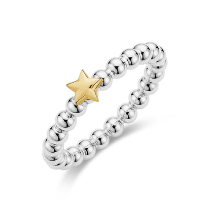 Close-up view of a shiny beaded stainless steel ring with a gold star accent on white background