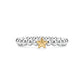 Side view of a polished beaded stainless steel ring with a small gold star detail