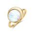 Close-up side perspective of Moonlight Mother of Pearl ring in gold-tone with round pearl center and polished band