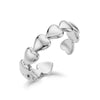 Close-up of Linked Hearts Open Ring in polished silver stainless steel showing linked heart shapes in an open band design
