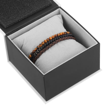 Set of three men's bracelets featuring brown leather, Tiger Eye beads, and black stainless steel links  