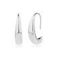 Silver sculpted teardrop hook earrings showing smooth polished finish and curved design