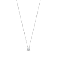 Silver minimalist bezel set solitaire pendant necklace with cubic zirconia on adjustable chain