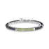 Double row bracelet with stainless steel box chain and faceted black hematite beads accented by green cyan beads on white background