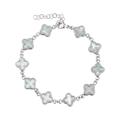 Close-up of mother of pearl clover bracelet in stainless steel with chain and lobster clasp