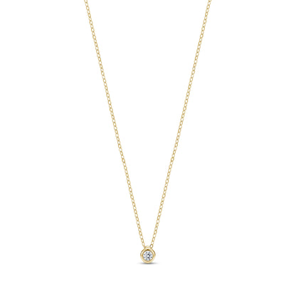 Gold minimalist bezel set solitaire pendant necklace with cubic zirconia on adjustable chain