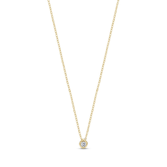 Gold minimalist bezel set solitaire pendant necklace with cubic zirconia on adjustable chain
