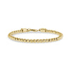 Gold stainless steel diamond cut round bead bracelet with 7.5 inch length and 1 inch extension