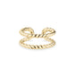 Gold twisted cable ear cuff front view with polished finish
