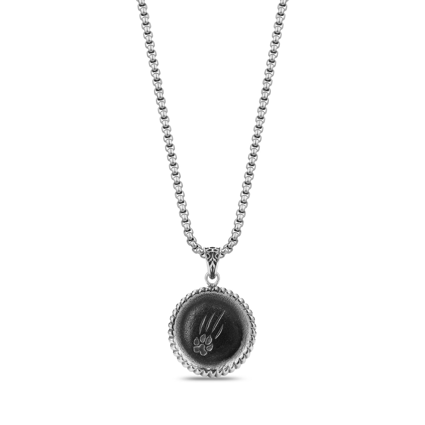 Back view of lion pendant showing engraved claw mark design on stainless steel surface