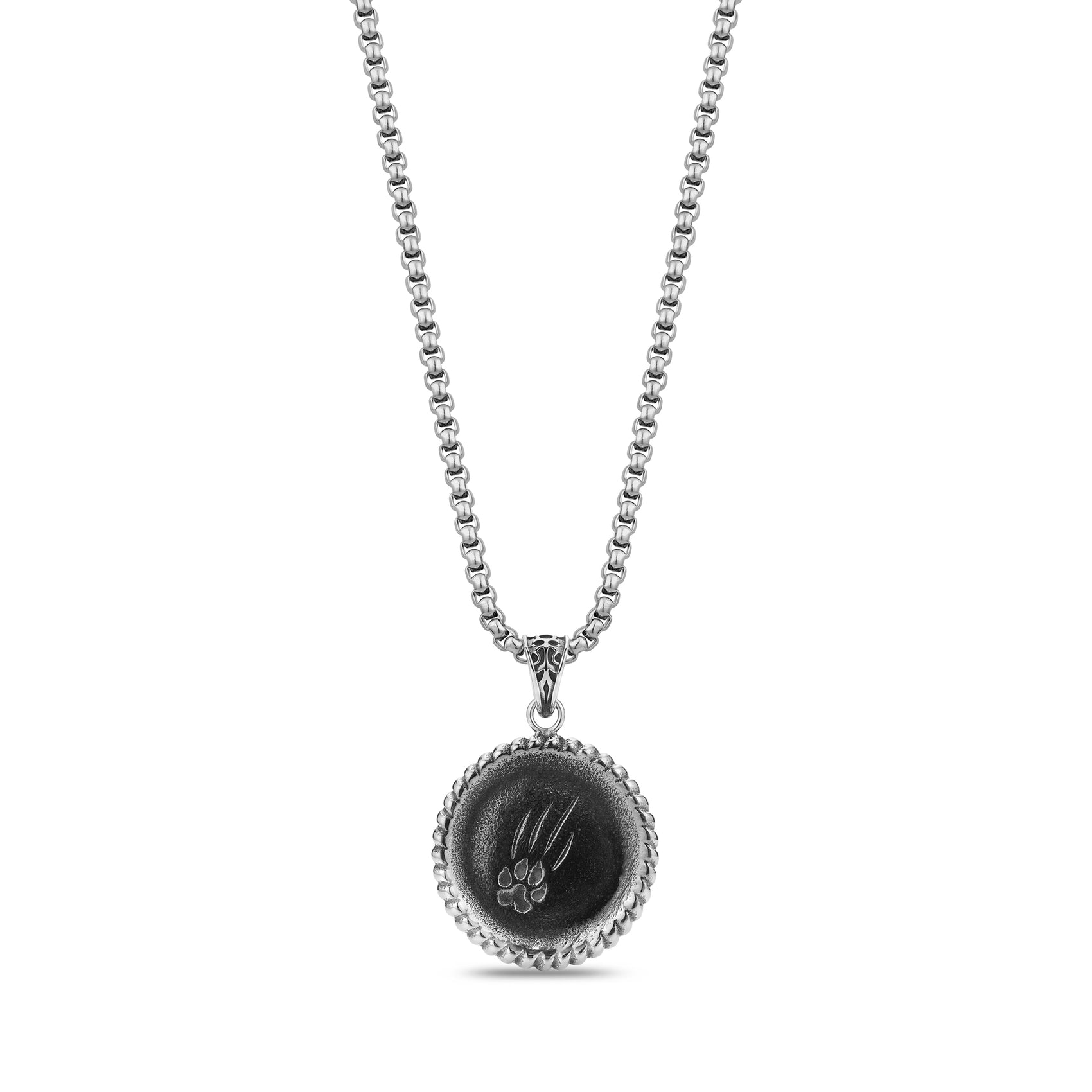 Back view of lion pendant showing engraved claw mark design on stainless steel surface