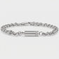 Video of a silver stainless steel lab diamond urn bracelet on a rolo link chain, showing the cylindrical memorial capsule with a row of lab diamonds and lobster clasp